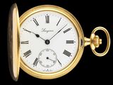 une montre de poche en or avec des chiffres romains