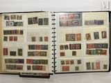 an open book with a lot of stamps on it
