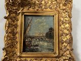a painting of a golden frame with a picture of a boat in the water