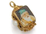 an image of a picture of a man with a beard and a hat on a pearl bead