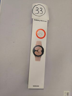 a box with a watch inside of it on a table