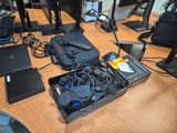 a desk with a bunch of computer equipment on it