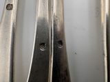 a close up of a fork and a spoon on a table