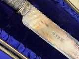 a knife in a case that is sitting on a table