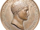 gros plan d'une pièce de monnaie sur laquelle figure une tête d'homme