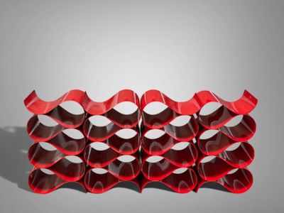 red wine bottle holder with six rows of empty wine bottles