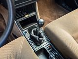 a close up of a car ' s interior with a gear stick in it