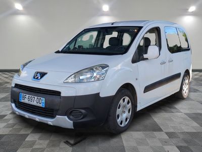 a picture of a small white van parked in a garage