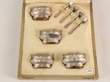 silverware in a box with spoons, forks and spoons in it