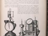 an open book with a picture of a clock and a clock on it