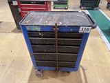 a blue tool cart that is sitting on the floor