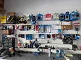a wall of tools on the wall in the garage