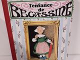 un livre avec la photo d'une petite fille en robe