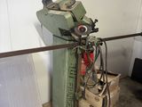a machine that is sitting on a pallet in a room
