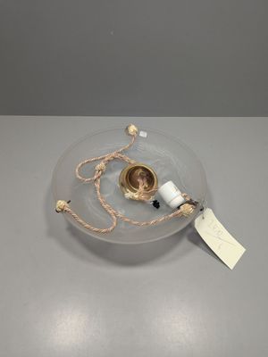 a glass plate with a gold ring on it