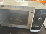 a microwave that is sitting on top of a table