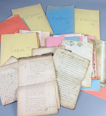 a pile of old papers that have been left on the table