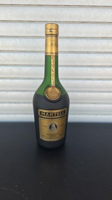 a bottle of liquor that is sitting on a table