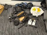 a pile of items on the floor next to a window