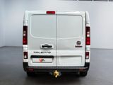 a white van that is parked in a room