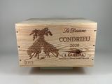 a wooden box with a horse on it sitting on top of a table