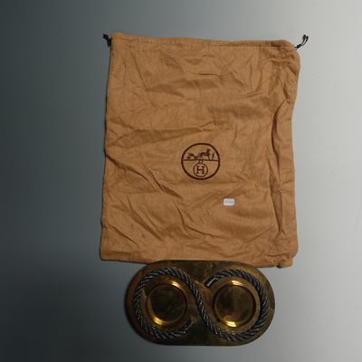 a brown bag with a pair of glasses on top of it