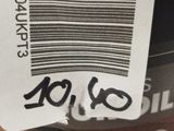 a close up of a bottle of wine with a barcode on it