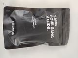 a black bag with a white logo sitting on a table