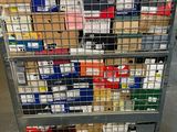 a cart with many boxes on it in a warehouse