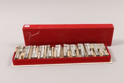 an image of a red box filled with lots of silverware