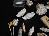 a lot of miniature figurines that are on a table