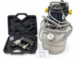 a metal container with a gas can and tools in it