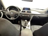 a view of the inside of a car from the driver ' s seat