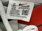 a label on a shoelacee that is attached to a shoe