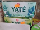 many boxes of toothpaste and toothbrushes on the counter