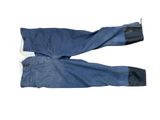 pair of blue jeans on a white background with a white background