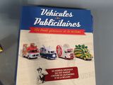 a book on the table next to a toy truck