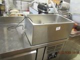 a machine that is sitting on a counter in a kitchen