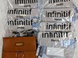 five bags of infiniti products wrapped in plastic