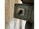 a close up of a machine with a button on it