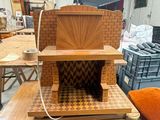 a small oven sitting on top of a table in a room