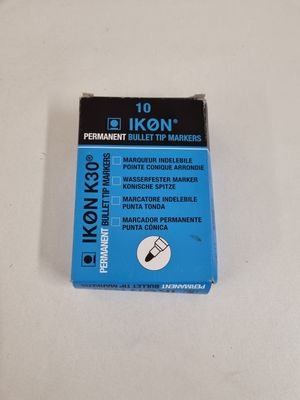 a close up of a box of ink on a table