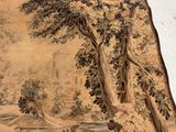 a picture of a tapestry hanging on a wall