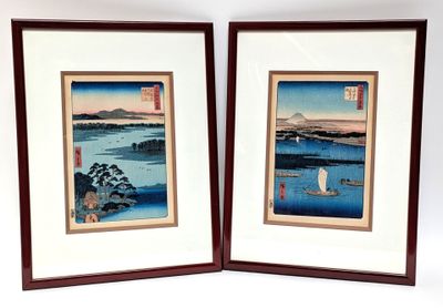 two framed prints of a couple of boats on a body of water
