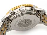 an image of a close up of a watch on a white surface