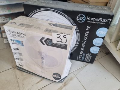two boxes of homeplus products sitting on the floor