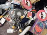 a pile of assorted items sitting on top of a table