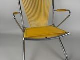 an image of a yellow chair on a white background