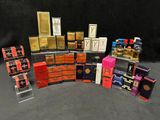 many different types of perfumes on display on a table