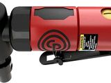 an image of a red and black electric driller on a white background